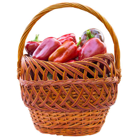 Basket with red pepper isolated on white background.の写真素材