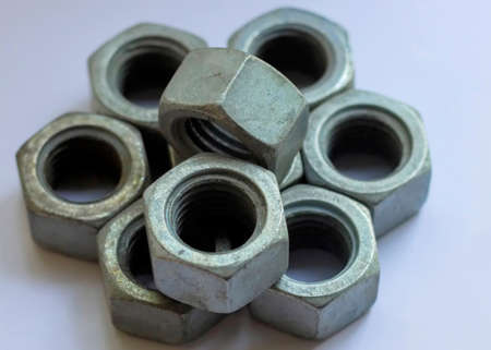 Bolt, nut, hardware, industrial, closeup, construction, fastener, industry, metal, metallic.の写真素材