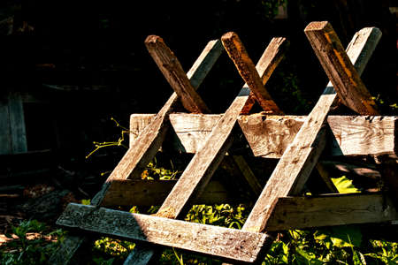 Antique device for sawing logs with a hand sawの写真素材