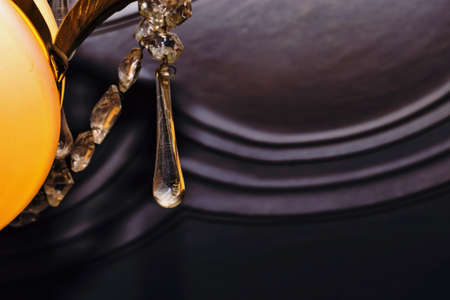 Yellow chandelier with a glass patternの写真素材