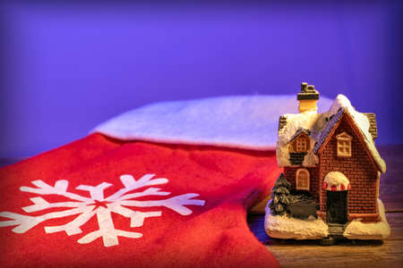 christmas gingerbread house on a red backgroundの写真素材