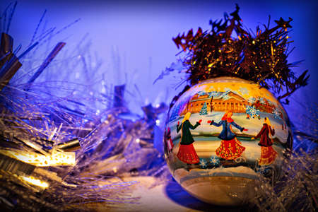 Christmas ball with a shiny garlandの写真素材