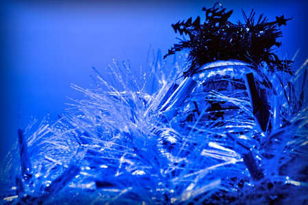 Christmas ball with a shiny garlandの写真素材