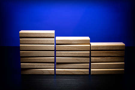 Wooden blocks in the form of steps. Ladder career path concept for business growth success process.の写真素材