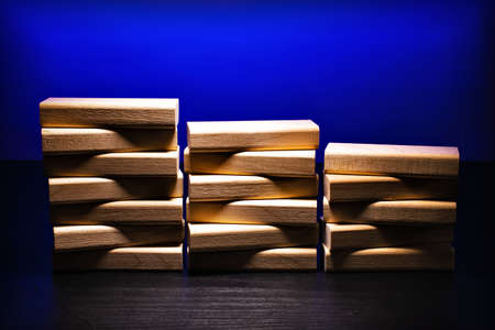 Wooden blocks in the form of steps. Ladder career path concept for business growth success process.の写真素材