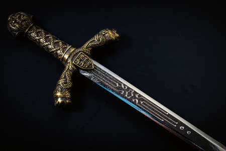 Knight sword on a black background