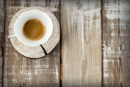 cup of coffee on wooden background with copy space for textの写真素材