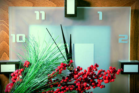 Christmas background with decorations and a clock before the New Yearの写真素材
