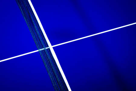 abstract background with a table for a table tennis in blue with white linesの写真素材