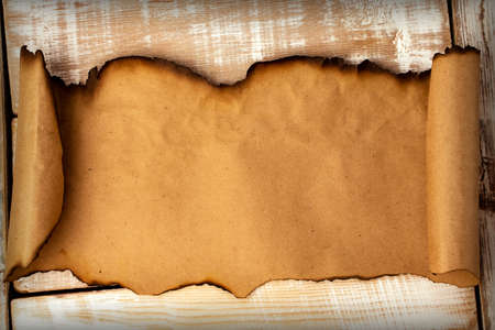 old paper on wooden backgroundの写真素材