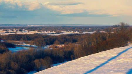 Winter landscape with snow covered mountainsの写真素材