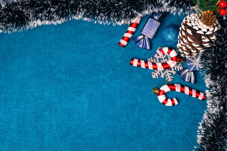 Christmas decorations on a blue background. Festive postcard. Copy spaceの写真素材