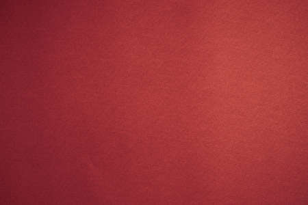 Blank background texture of red velvety paper. Design layout.の写真素材