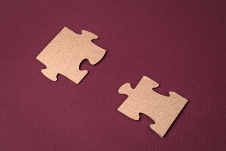 Close-up of puzzle elements on a purple background. Business solutions, success and strategy conceptの写真素材