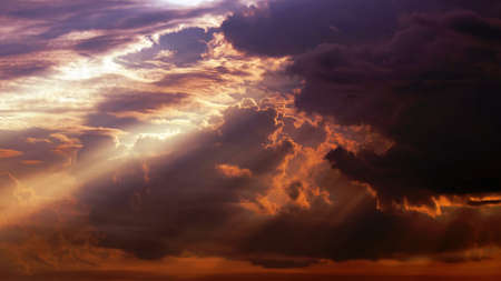 Dramatic sky with beautiful clouds at sunset. beauty of natureの写真素材