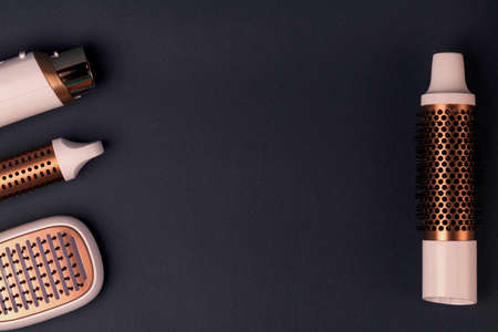 Layout of Hairdresser tools on dark background. Copy spaceの写真素材
