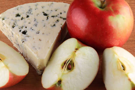 Stock Photo of Blue Cheese from Cow Milk served with cut Tart Apples  の写真素材