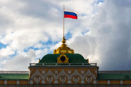 russian state flag on the big kremlin palaceのeditorial素材