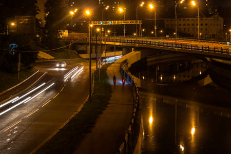 dark, river, water, reflection in water, embankment, boardwalk,の写真素材