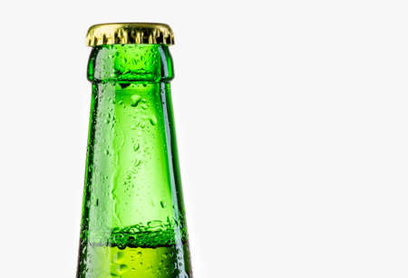 Green beer bottle with water dropsの写真素材