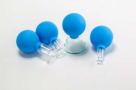 Vacuum jars for a massotherapy on the white backgroundの写真素材