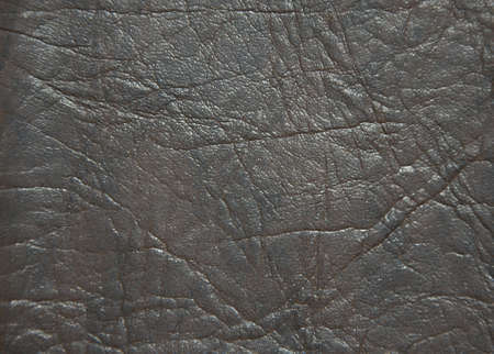 Decorative surface imitating artificially made leather. The picture was taken in the daytime,...