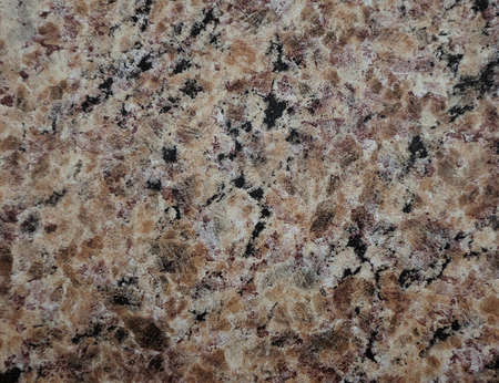 Natural granite, polished surface of the natural stone pattern. Background. texture.