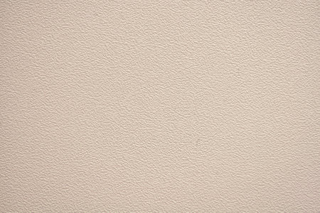 Monochrome rough white surface with gradient and close-up vignetting. Background, texture, blank.の写真素材