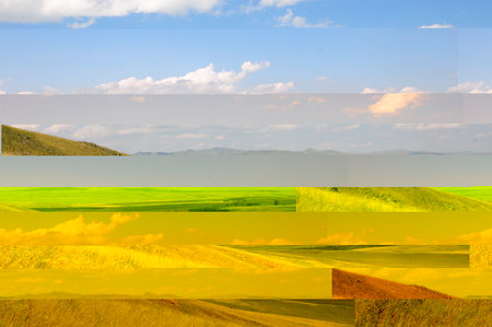 The gentle slope of a high hill on the edge of a vast steppe under a summer cloudy sky. Sagay...