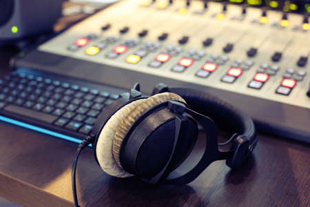 Stereo headphones on the Desk in the Studioの写真素材