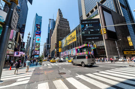 NEW YORK CITY - JULY 12: Undefined people pass through Times Square on July 12, 2012 in New York. Times Square is a major commercial intersection in Manhattan.のeditorial素材