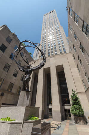 NEW YORK CITY - JULY 12: Statue of Atlas near Rockefeller Center on July 12, 2012. Rockefeller Center is a complex of 19 commercial buildings covering 22 acres between 48th and 51st streets in New York City, United States. Built by the Rockefeller family,のeditorial素材