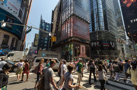NEW YORK CITY - JULY 12: People cross seventh avenue on July 12, 2012 in New York. 