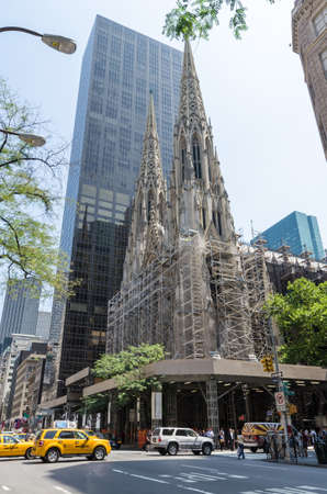 NEW YORK CITY - JULY 12: St. Patrick Cathedral facade under reconstruction on July 12, 2012 in New York. The Cathedral of St. Patrick is a decorated Neo-Gothic-style Roman Catholic cathedral church.のeditorial素材