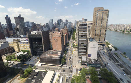 NEW YORK CITY - JULY 12: Traffic at York Avenue on July 12, 2012 in Manhattan, New York.  Manhattan is a major commercial, economic, and cultural center of the United States.のeditorial素材