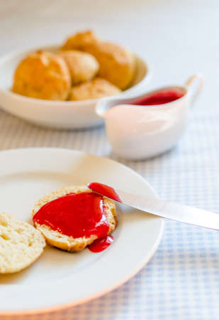 Scones with redcurrant jamの写真素材