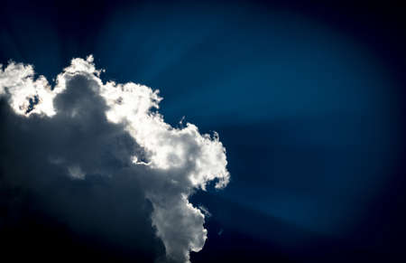 Cloud with raysの写真素材
