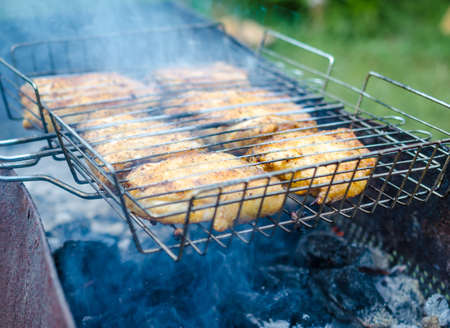 chicken thighs on the grillの写真素材