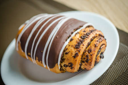 cup of coffee and chocolate bunの写真素材