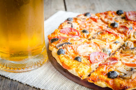Pizza with beerの写真素材
