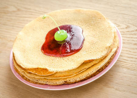 crepes with cherry jamの写真素材