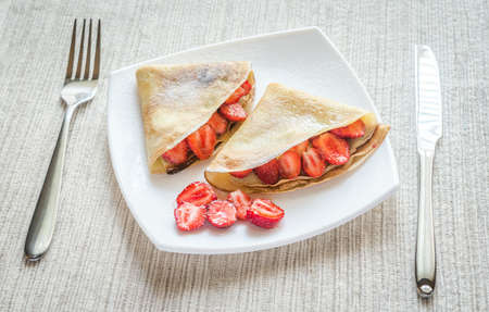 Crepes with fresh strawberriesの写真素材
