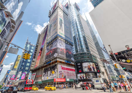 NEW YORK - JUL 22: 42nd Street near Times Square with traffic and commercials on July 22, 2014 in...