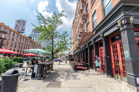 NEW YORK CITY - JUL 22: Ninth avenue on July 22, 2014 in New York. 9th Avenue, known as Columbus Avenue is a southbound thoroughfare on the West Side of Manhattan.のeditorial素材