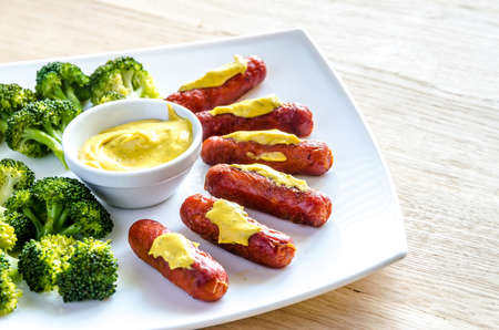 sausages with collie flower and mustard の写真素材