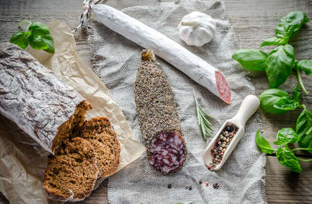 saucisson and salami with breadの写真素材