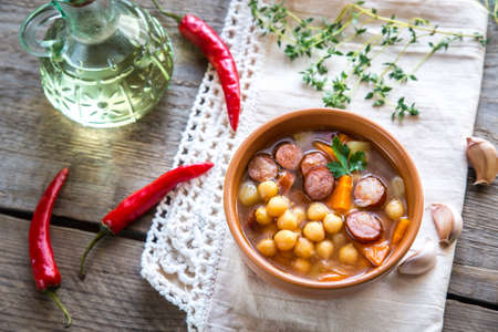 Soup with chickpeas and smoked sausageの写真素材