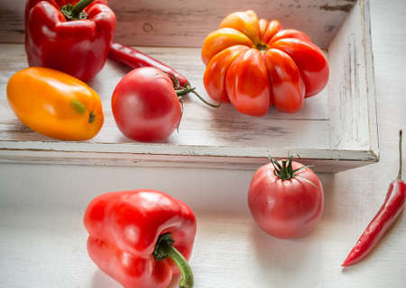 Fresh tomatoes and peppersの写真素材