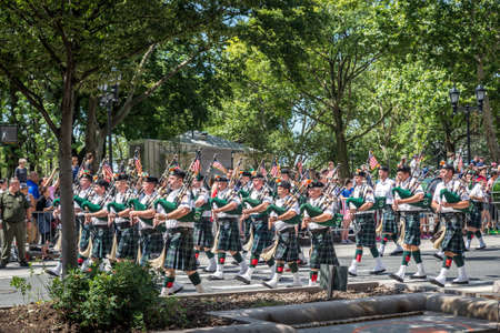 NEW YORK CITY - JULY 10: A band plays during the ticker-tape parade on July 10, 2015 in NYC. The parade has been organized to celebrate the U.S. women's soccer team's World Cup final win.のeditorial素材