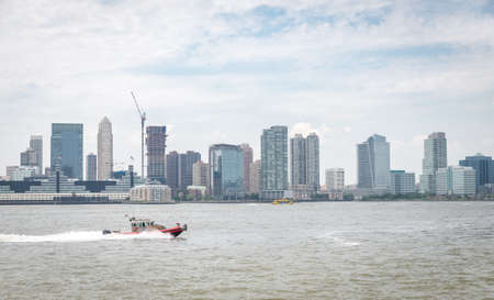 NEW YORK CITY - JULY 13: View on Jersey City on July 13, 2015 in New York. Jersey City is the second-most populous city in the U.S. state of New Jersey.のeditorial素材